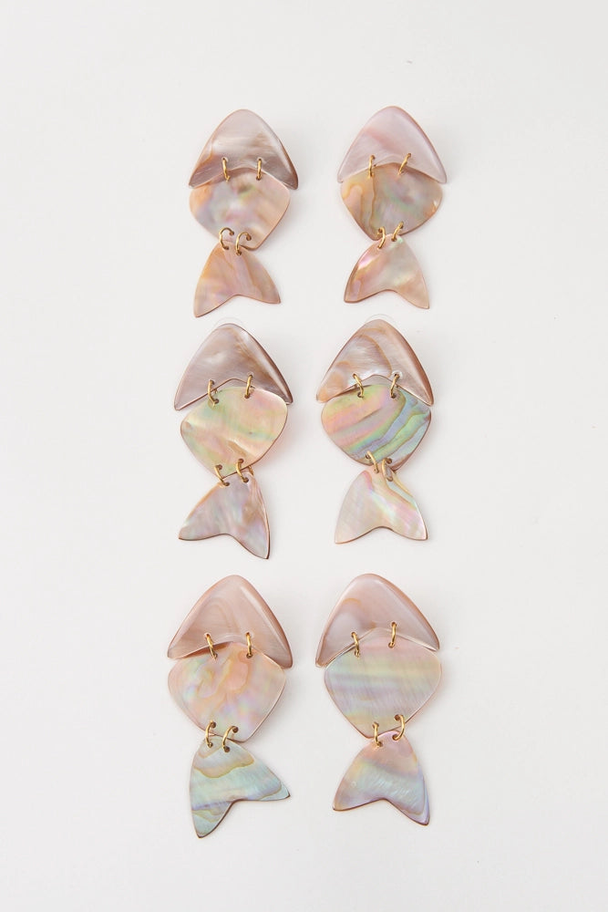 Three pairs of Shellfish Earrings are shown. Due to the natural materials used, the color and markings of the shell vary slightly between pairs.