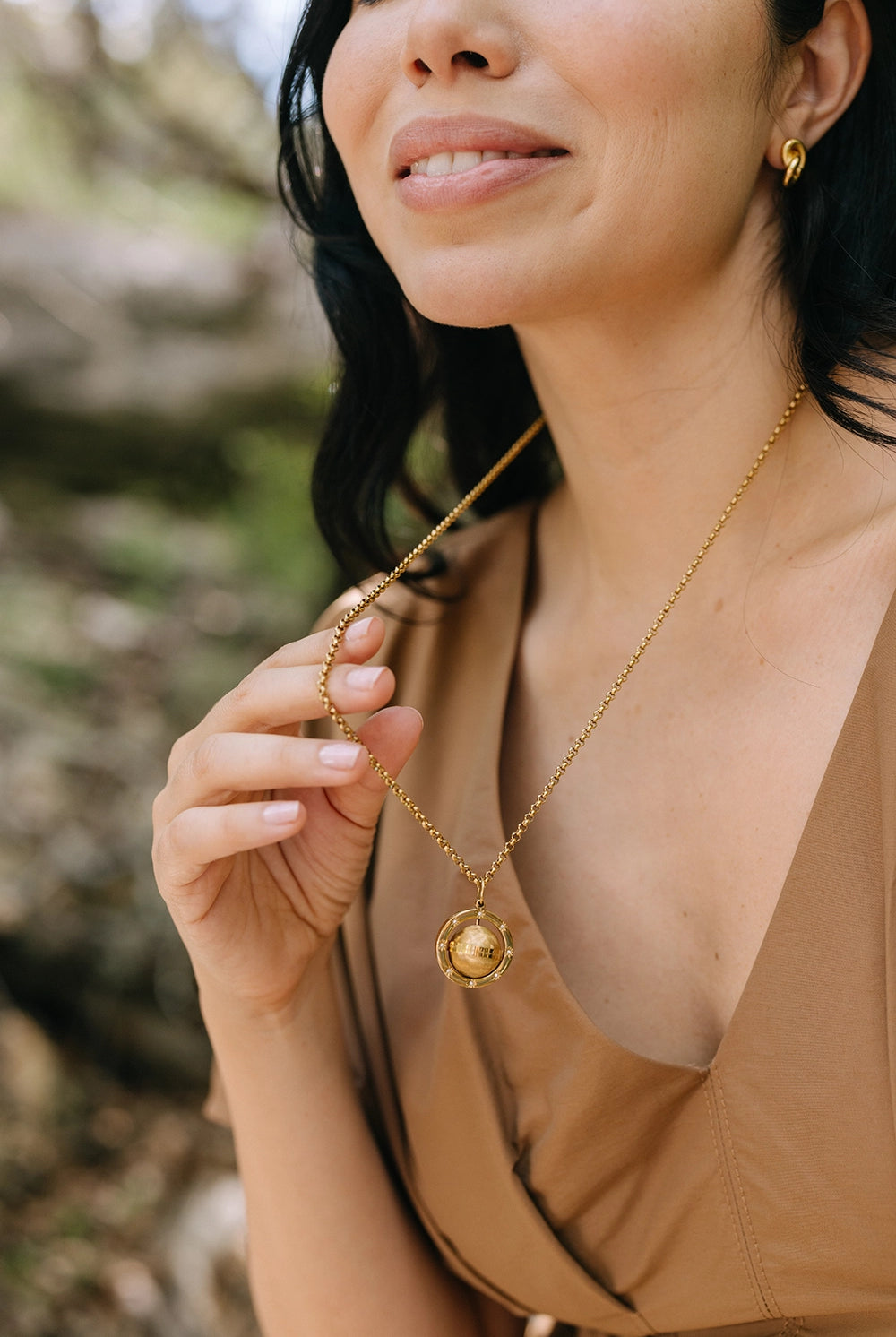 Love Makes The World Go Round Pendant - NECKLACES