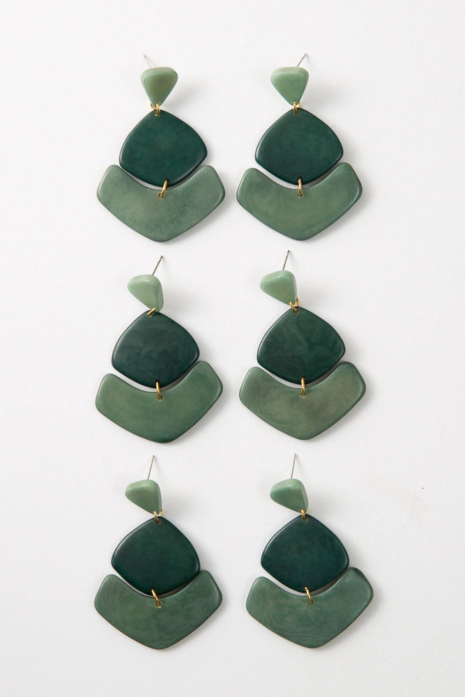 Three pairs of Tortuga Earrings are pictured, showing the natural variations in shade that can occur.