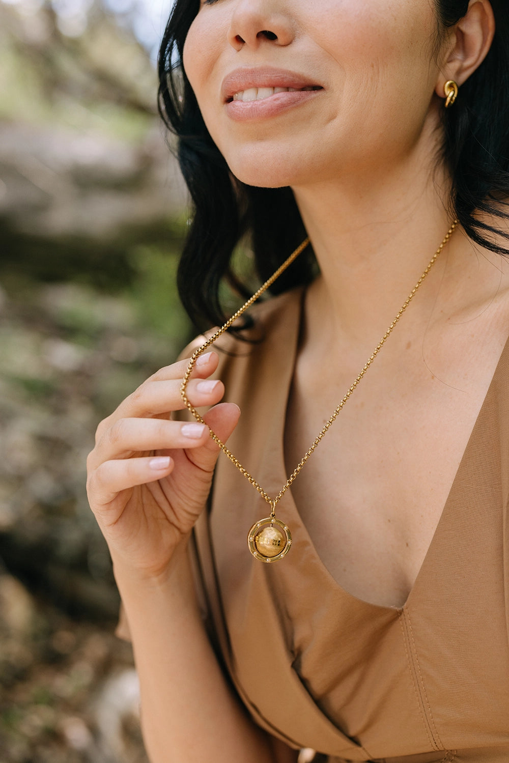 Love Makes The World Go Round Pendant - NECKLACES